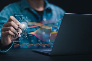 Person working with AI on their laptop