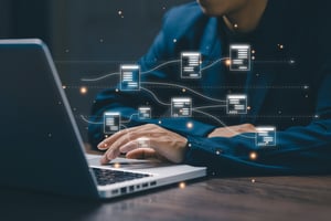 Person Working on Data Integration on a Computer
